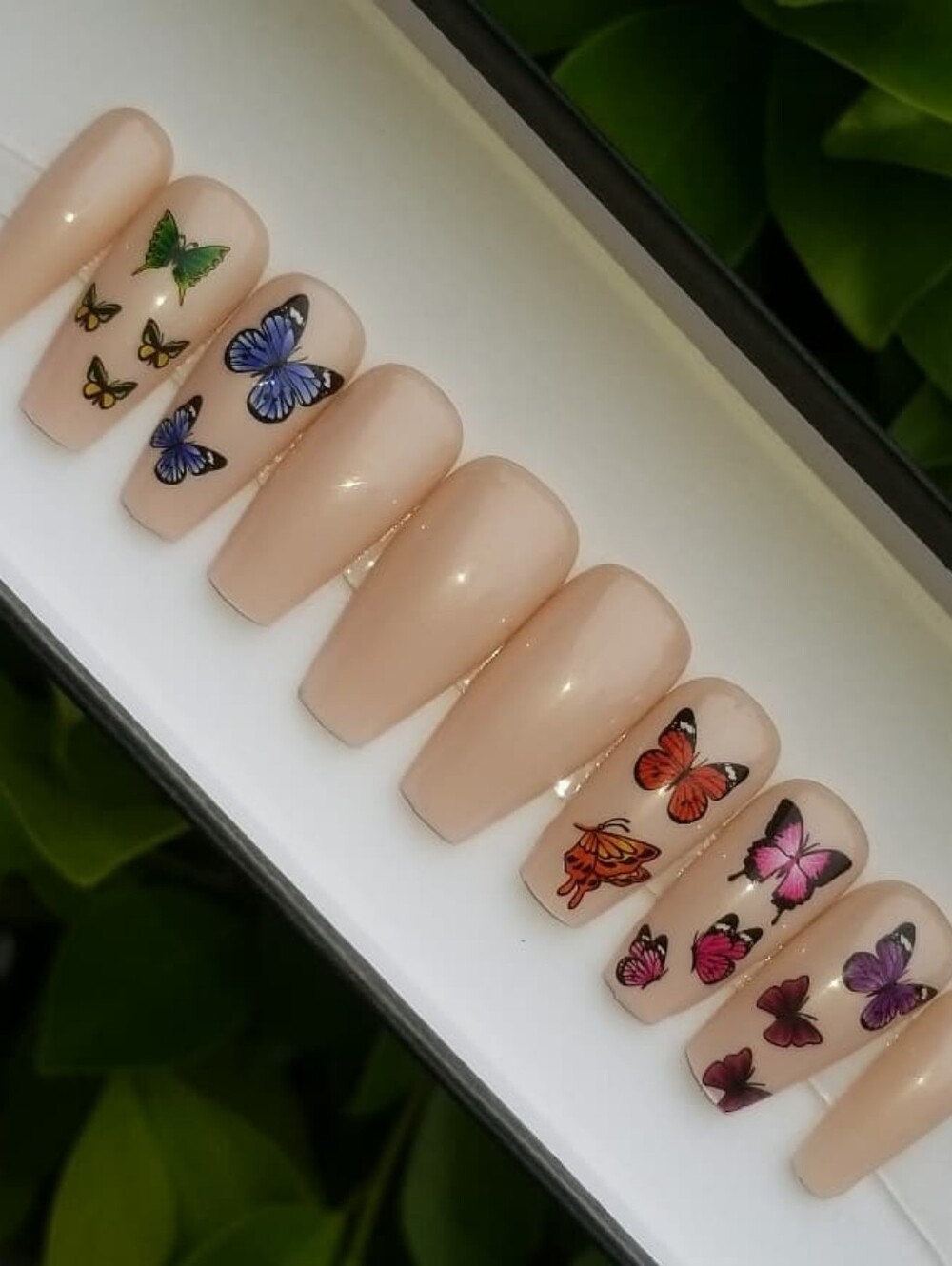 Nude Press-On Nails with Colorful Butterfly Accents